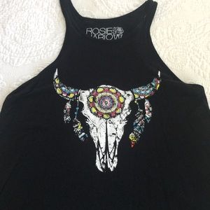 Black tank top with cow skull graphics.